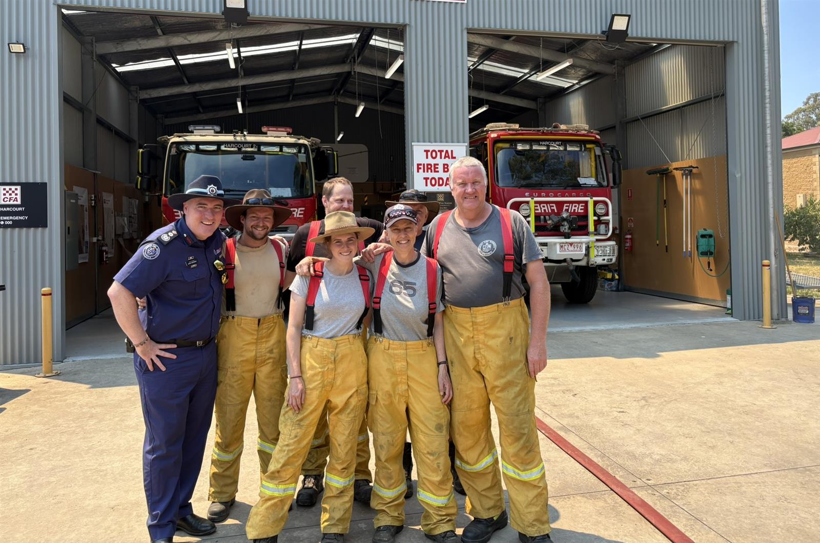 CFA Chief Officer Jason Heffernan with Harcourt brigade members Captain Andrew Wilson, Sue Bray, Jess Bell, John Bell, Nathaniel Polhe and Peter Church