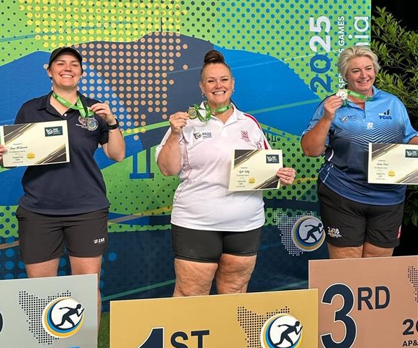 Kylie on the winners' podium