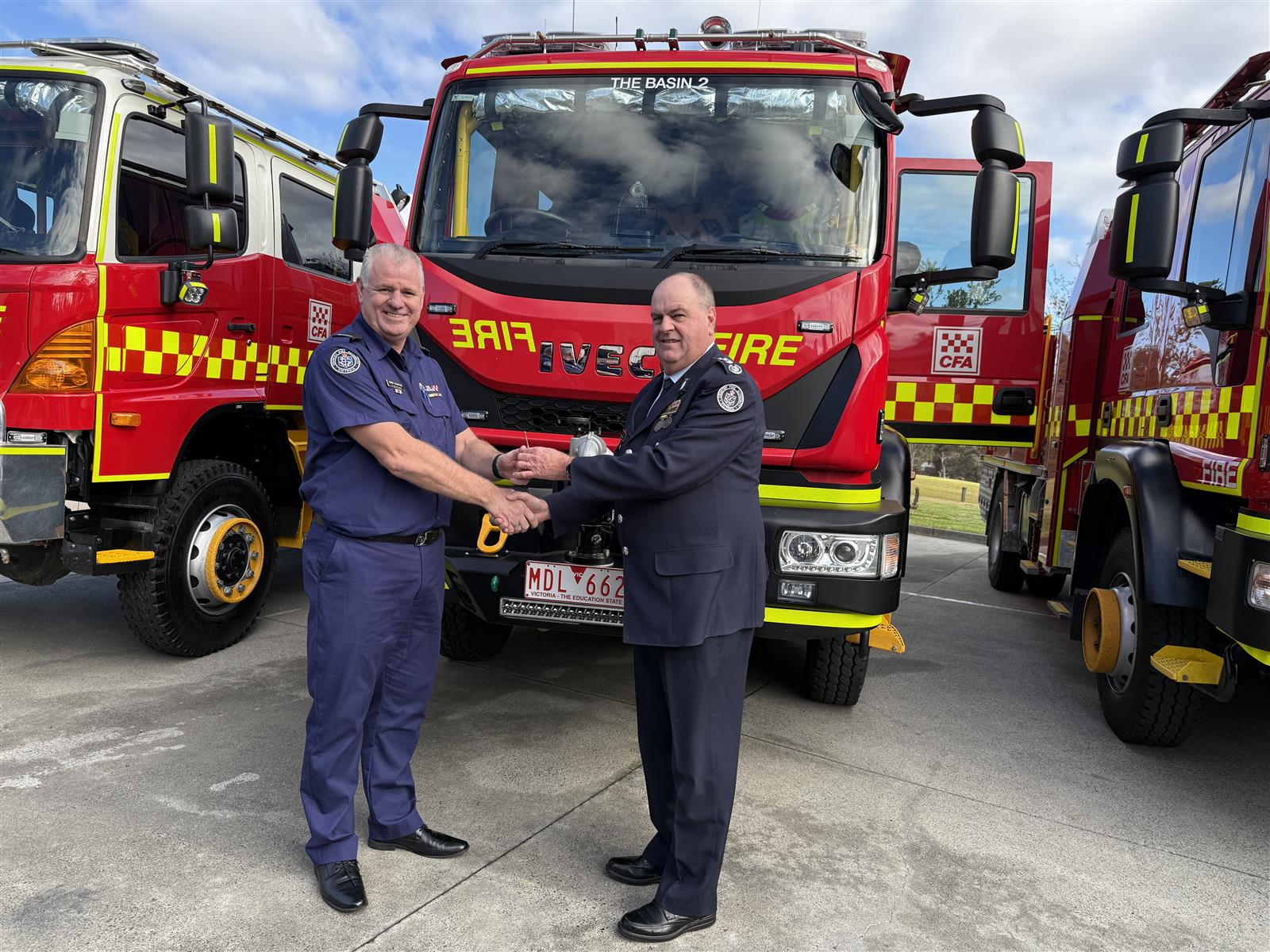 ACFO David Renkin handing the keys to The Basin Captain Corey Schmutter