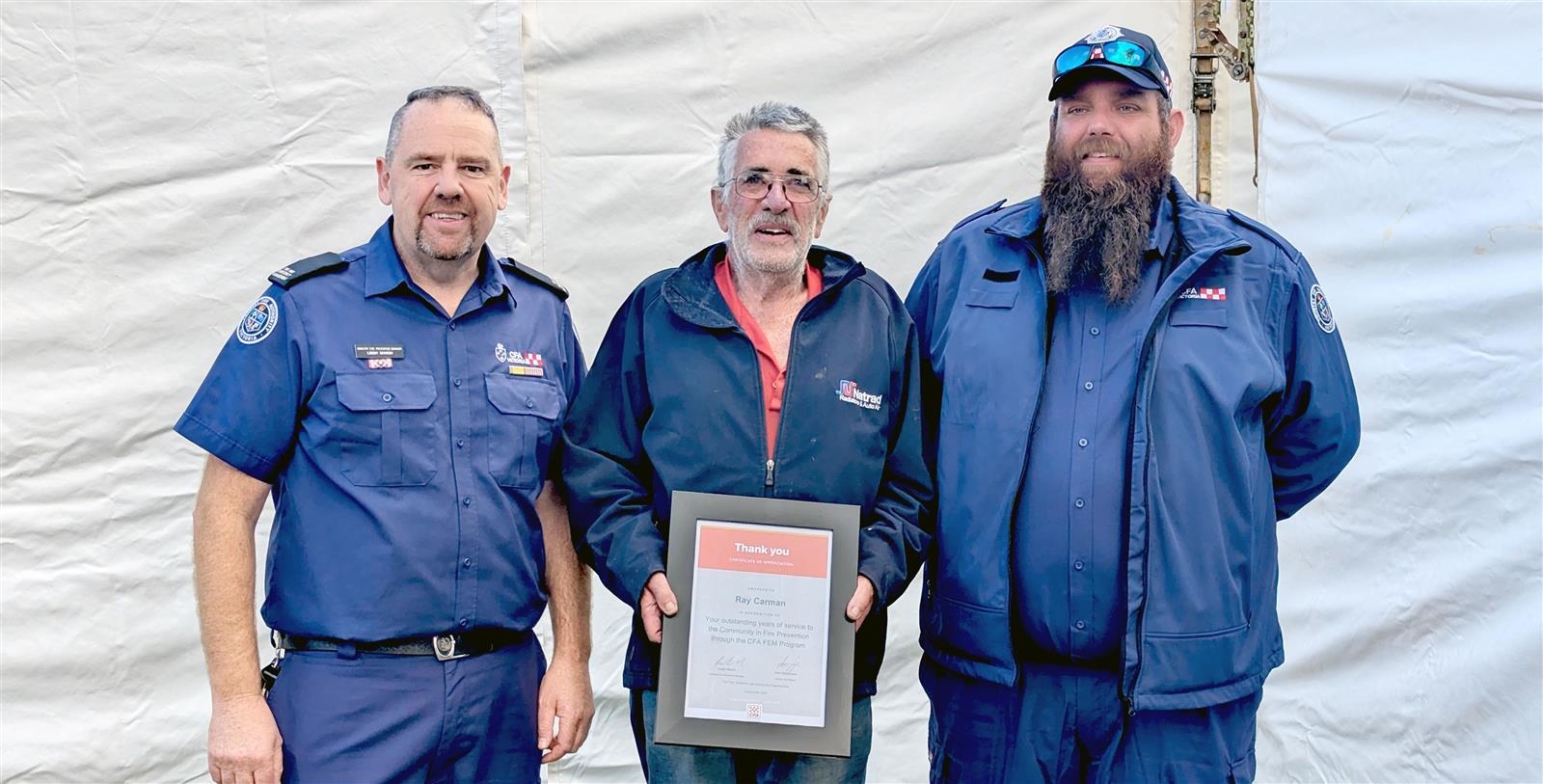 Ray (centre) with Industry Fire Prevention Manager Leigh Marsh (left) and son Steve (right)