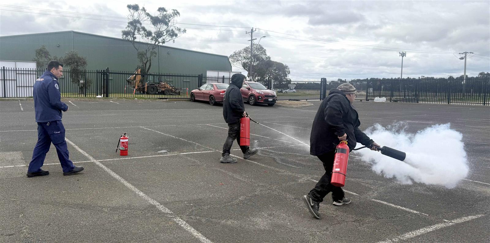 Industry Fire Prevention Officer Paul DiMartino takes the team through the training.
