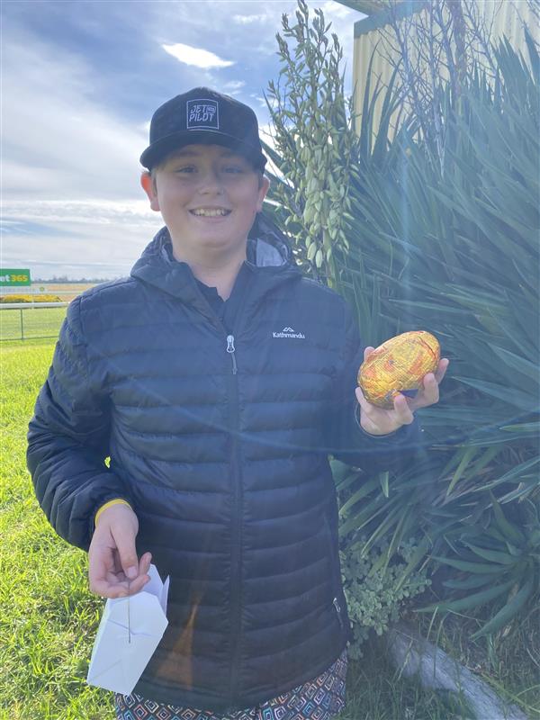 Harrison Whelan participating in the Easter Egg Hunt in 2022