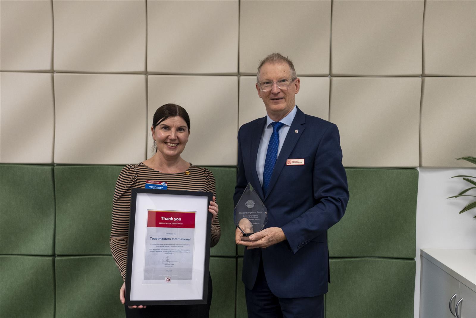 Toastmasters Region 12 International Director Monique Tonna with CFA CEO Greg Leach AFSM