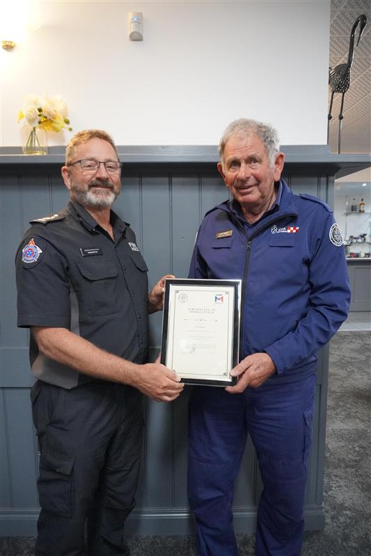 Clyde Bassett celebrated for 5 years CPMP mentoring certificate from ACFO Craig Brittain