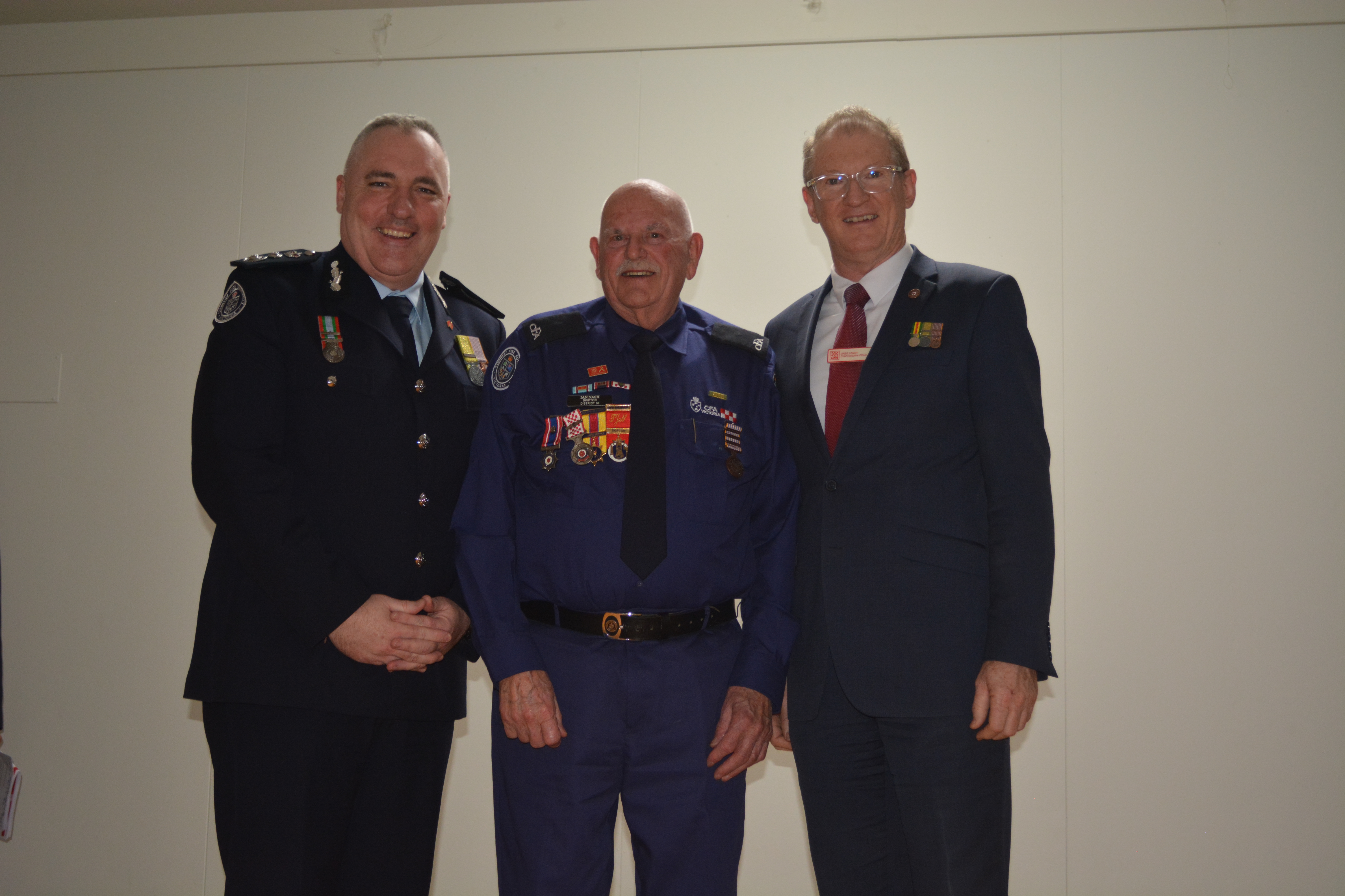 Firefighter Ian Nash receiving Outstanding Service Award