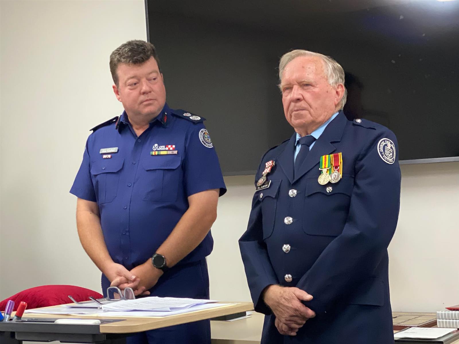 DCO Gavin Thompson Presenting Bill McIntosh with his 60-year medal and CFA Life Membership