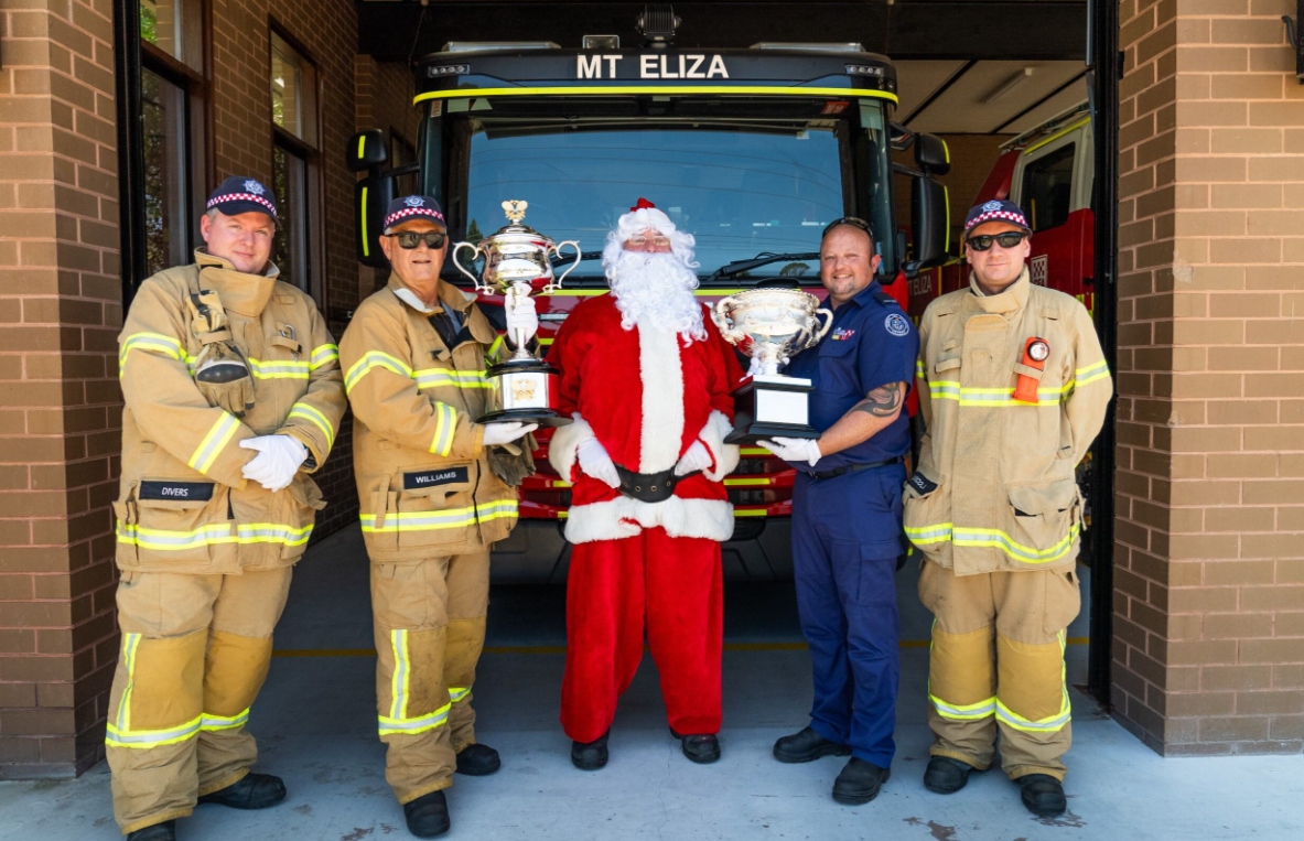 Left to right: Anthony Divers, Clive Williams, Santa Claus, Capt. Mark Turnham and Jack Jurcola
