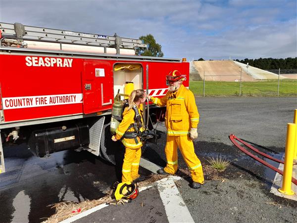 Image of two volunteers