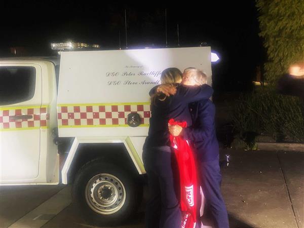 Image of two people hugging